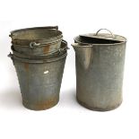 A large galvanised watering can together with four galvanised buckets of various sizes