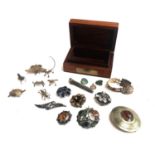 An interesting wooden box of silver/silver coloured items to include a frog, lizard, turtle,
