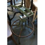 An industrial swivel chair base, labelled 'Evertaut'