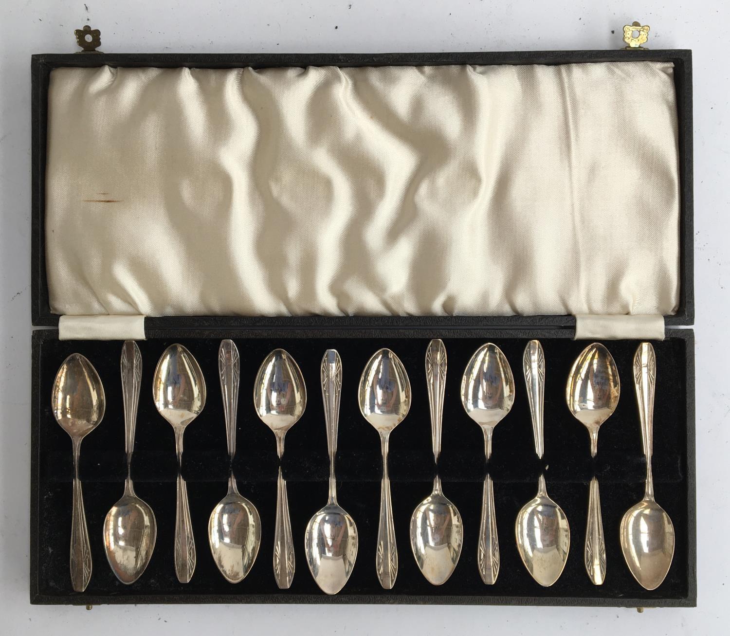 A cased set of 12 silver Art Deco coffee spoons, Birmingham 1937