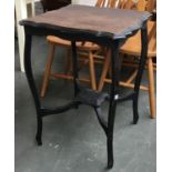 An ebonised occasional table with shaped top and undershelf, 73cmH; together with one other