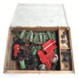 A 'Meccano' box containing assorted track, Britains and various other vintage toys