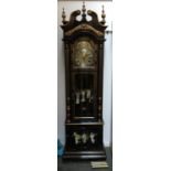An unusual 1960s Japanned long case clock, heightened in gilt, broken pediment over domed door,