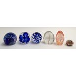 Six glass paper-weights including Caithness, Langham Art Glass, and others