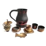 A mixed lot of metal items to include a copper pitcher; enamelled brass pot; candle holder; ashtray;