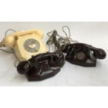 Two vintage bakelite children's toy telephones, one marked Chad valley; together with a vintage