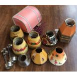 A collection of various small vintage light shades