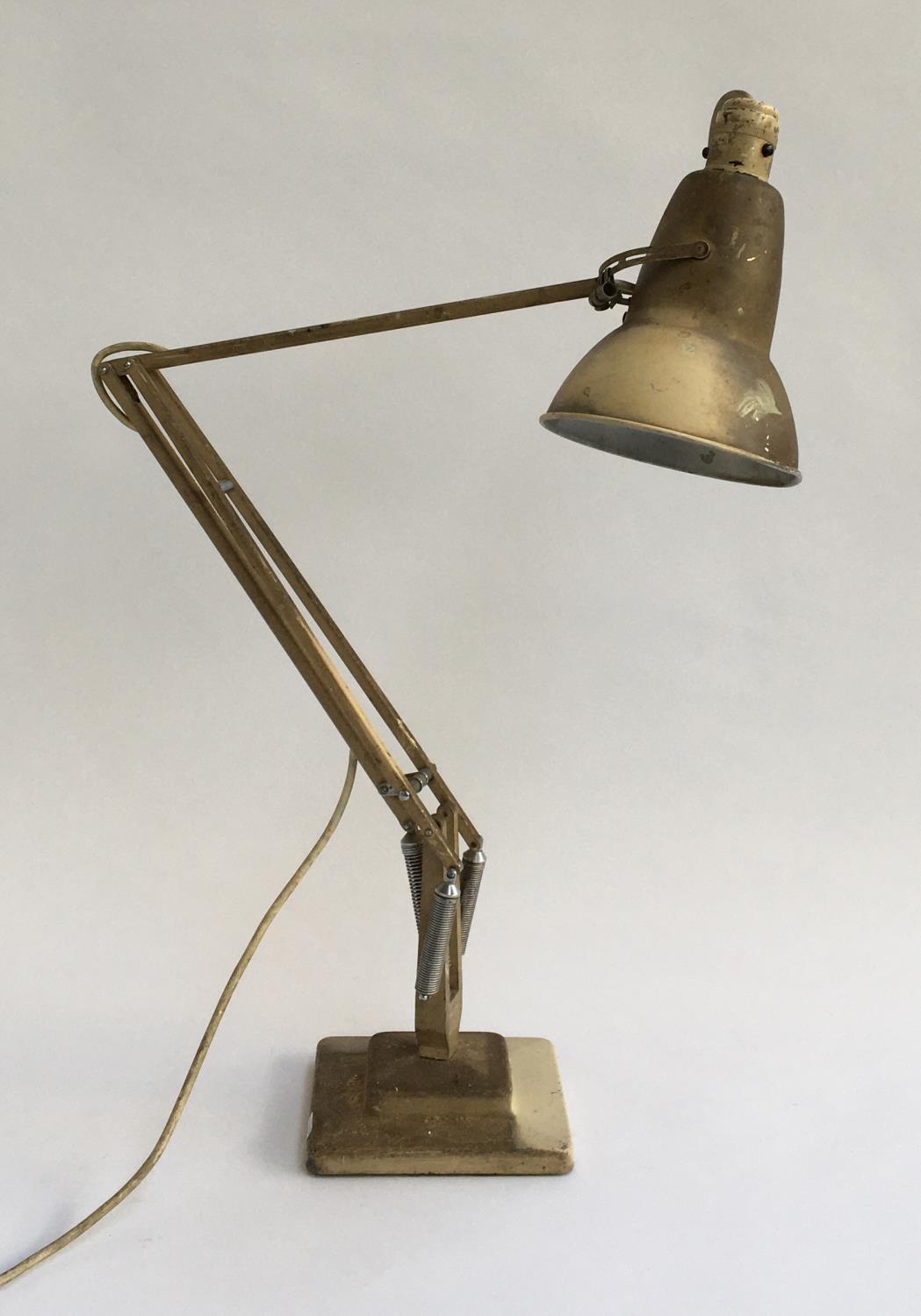 A Herbert Terry anglepoise lamp on square stepped base