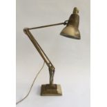 A Herbert Terry anglepoise lamp on square stepped base