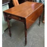 A 19th century mahogany Pembroke table, single end drawer on turned legs with brass casters, 92cmW