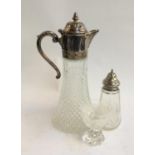 A glass claret jug, sugar shaker, and small cut glass toasting glass (3)