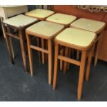 A set of six beechwood and vinyl upholstered 1950s kitchen stools, 61cmH