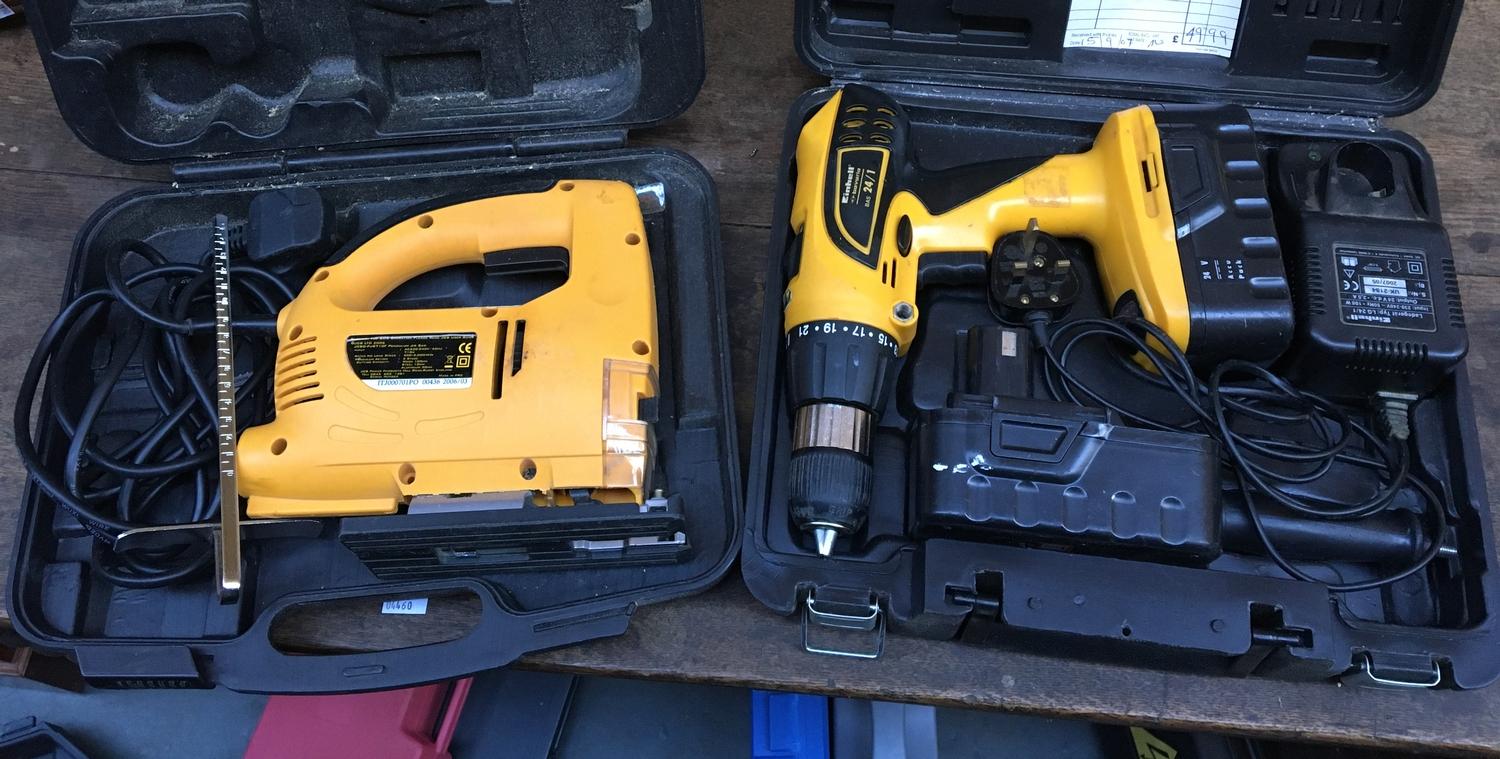 An Einhell cordless drill; and a JCB jigsaw, each boxed