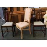 A pair of oak dining chairs with drop in seats; together with a continental occasional chair