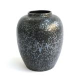 A Poole Pottery vase, black Calypso lustre pattern, 22.5cmH