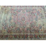 A large hand knotted West Persian carpet, 300x228cm