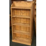 A small pine bookshelf, gallery top with three shelves, 63x24x137cmH