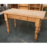 A 20th century pine kitchen table, single side drawer, on baluster turned legs, 122x59x78cmH