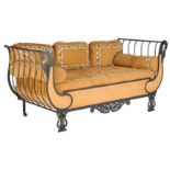 A painted cast iron sofa, in Empire style, 20th century, with suede cushions and bolsters, 105cm