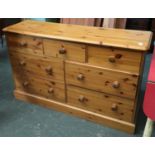 A pine sideboard with three short over two sets of two long drawers, 140cmW