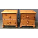 A pair of pine bedside tables, 46cmW