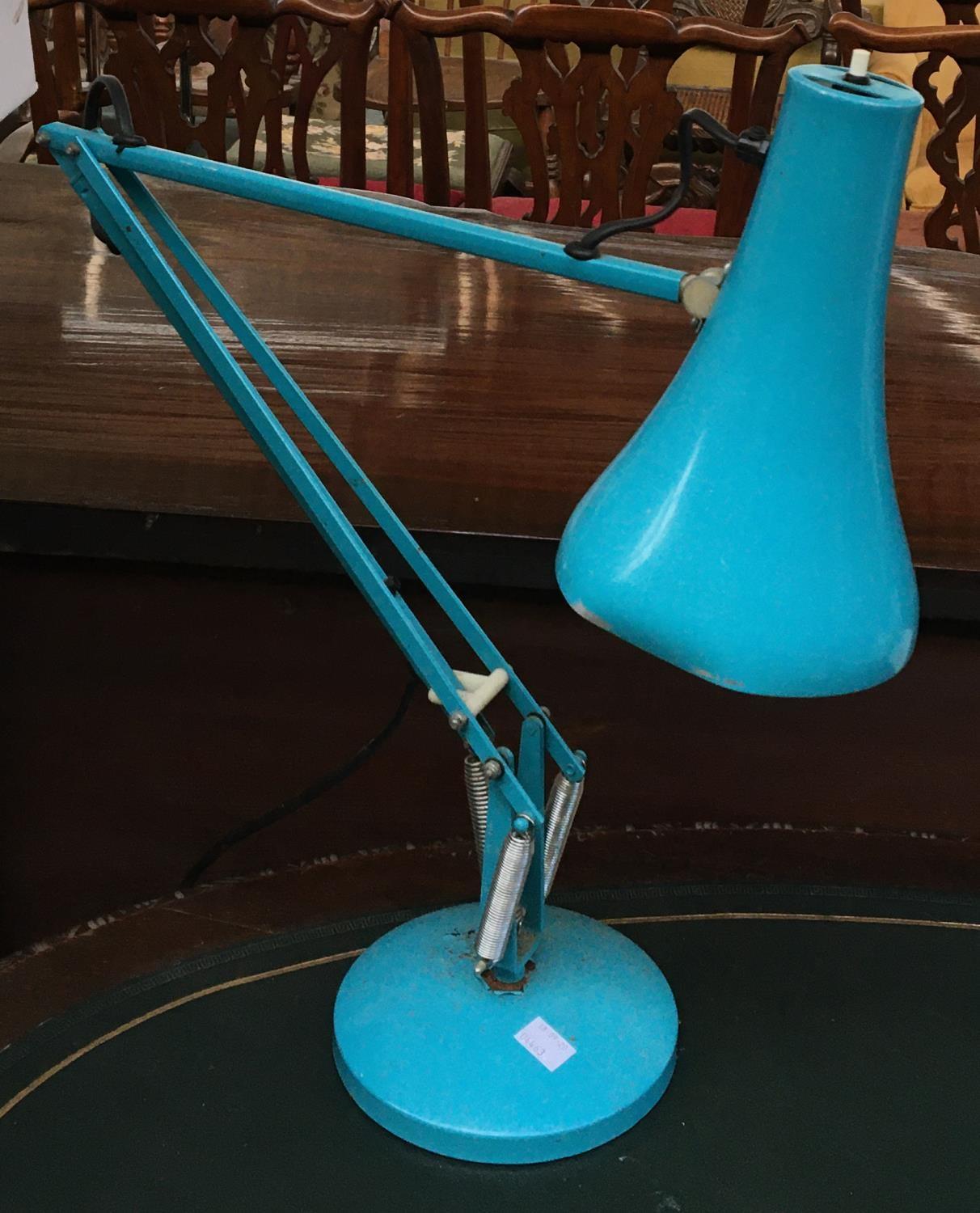 A blue anglepoise lamp