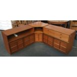 A mid century style corner sideboard suite, in three parts, comprising various draws and