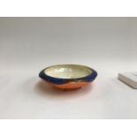 A Crown Ducal Art Deco 'Butterfly' design lustre bowl (af), marked to base, 25.5cm wide