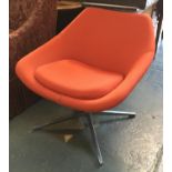 A 1970s swivel egg chair