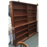A 19th century mahogany two section palace fronted bookcase, with ten adjustable shelves, approx.