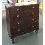 A stained pine chest of two short over three long drawers on turned legs, 105cmW