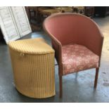 A Lloyd Loom corner laundry basket, bears label, together with a similar chair