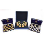 A boxed set of Old England Thistle blazer buttons; a boxed set of Old England anchor buttons; and