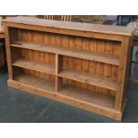 A pine bookshelf with two shelves, 152cmW by 92cmH