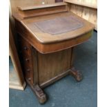 An early 20th century davenport desk, with cavetto superstructure, hinged marquetry lid, leather