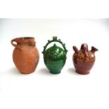 Three studio pottery items including Art Nouveau vase, probably Lakes Pottery, slipware water box,