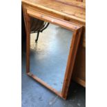 A pine framed rectangular wall mirror, 89x63cm