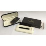 An Omas ball point pen Rolling Arte Italiana 206, purchased from Harrods, in leather slip case and