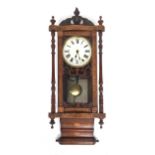 A Vienna regulator style wall clock, walnut with satinwood marquetry, within an architectural case