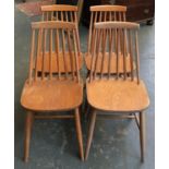 A lot of four Ercol style stick back kitchen chairs