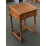 A pine school desk, with sloped top, 61x52x91cmH
