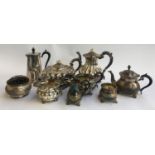 A mixed lot of plated wares to include a four piece tea service