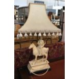 A figural table lamp in the form of a samurai on horse