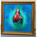 An illuminated spinning light box picture of The Sacred Heart of Jesus, approx. 33x33cm