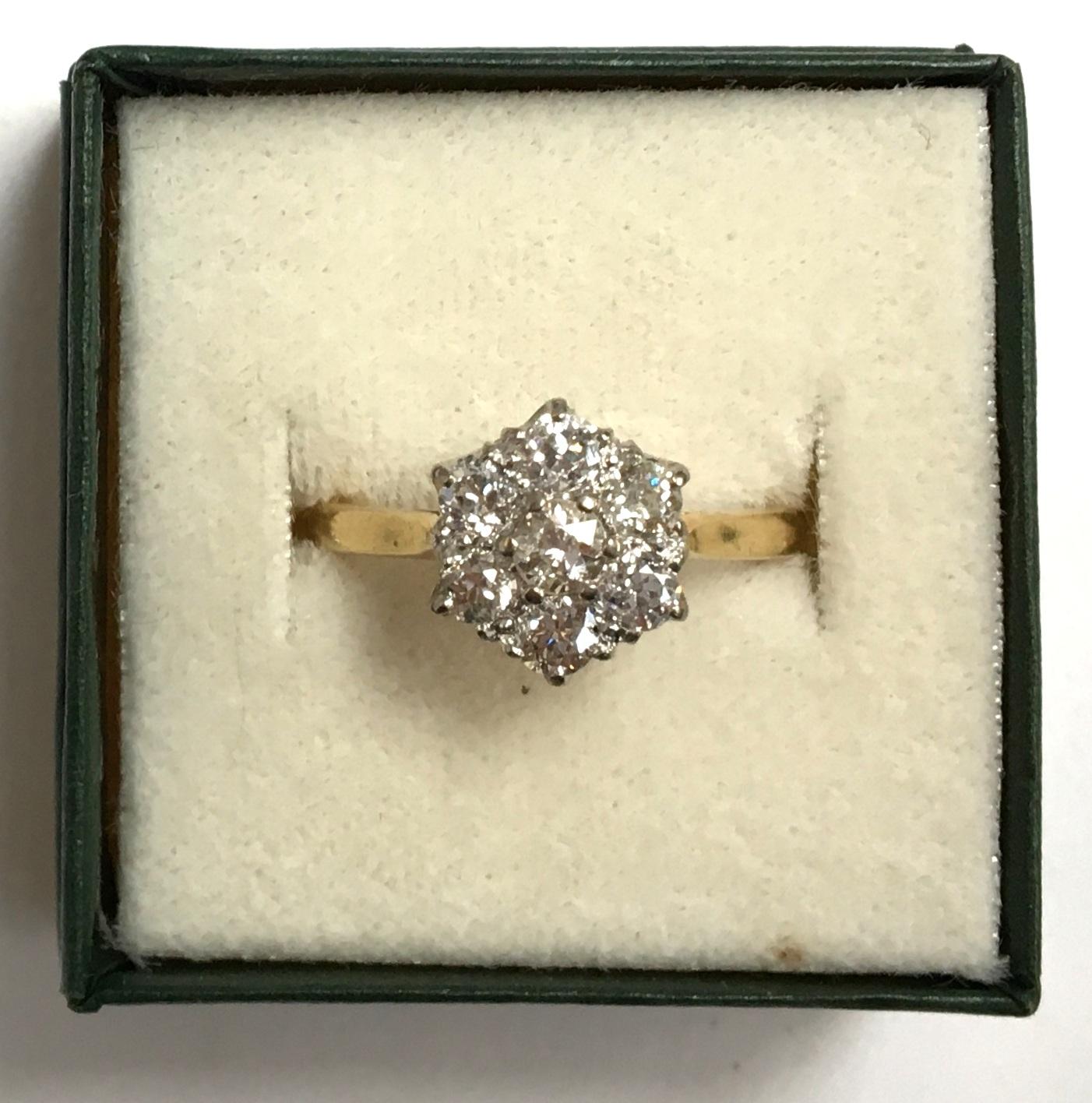 18ct gold ring set with 7 diamonds in a floral cluster gross weight 4.7g, approx 1.2 carats - Image 2 of 2