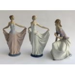 Two Lladro figures, each approx. 31cmH; together with one NAO figurine (3)