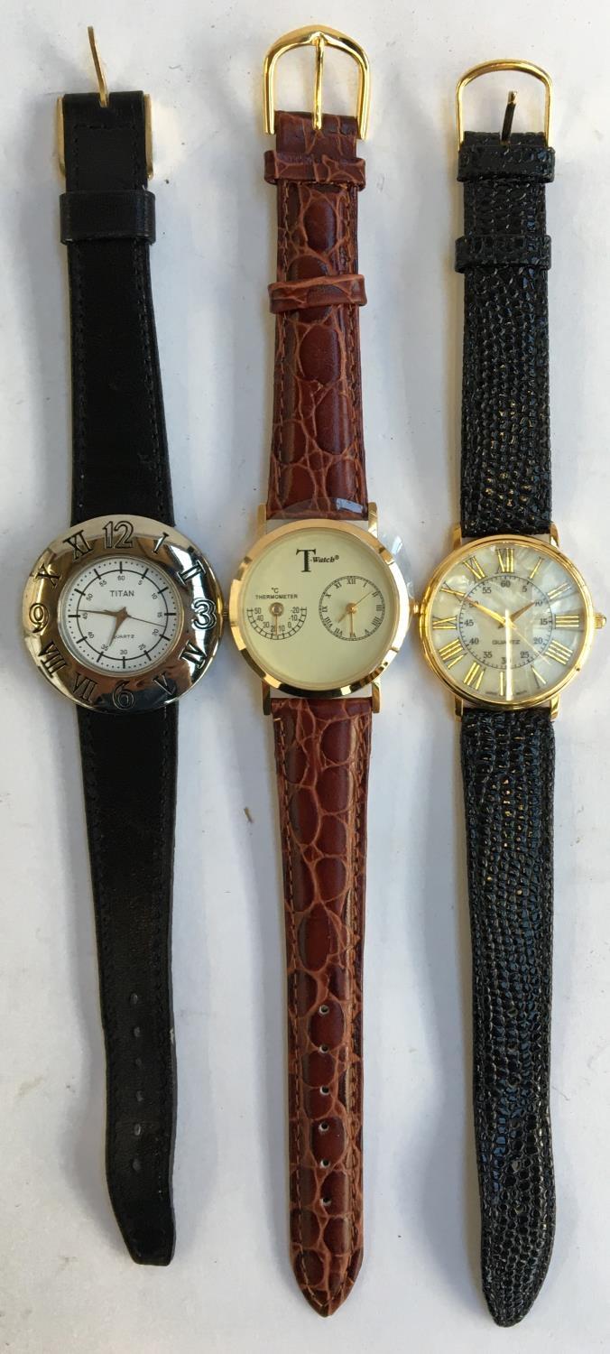 Three watches to include T-Watch, Titan and one other