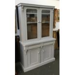 A grey painted mahogany kitchen cupboard with glazed doors above a cupboard base, 121cmW, 205cmH