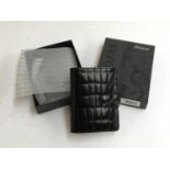 A Filofax leather wallet, with diary, boxed