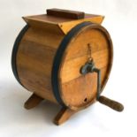 An oak coopered butter churn, made by R.A Lister & Co. Dairy Engineers